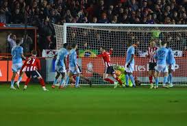 Exeter's MacDonald 'gutted' after FA Cup penalty miss