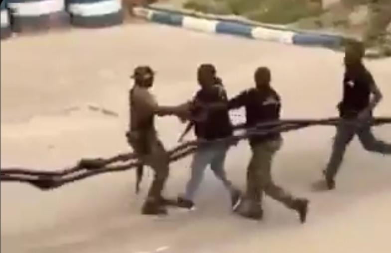 Video: Air Force, policemen in free-for-all over drug suspect