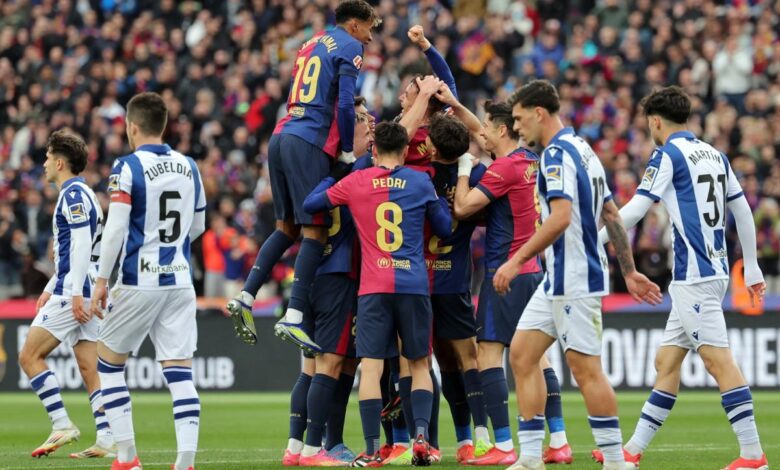 Barcelona thrash 10-man Real Sociedad to reclaim La Liga top spot